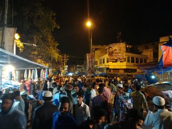 People on street at night