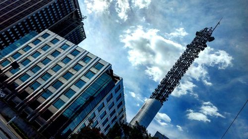 Low angle view of skyscraper against sky