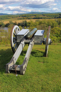 Built structure on field against sky