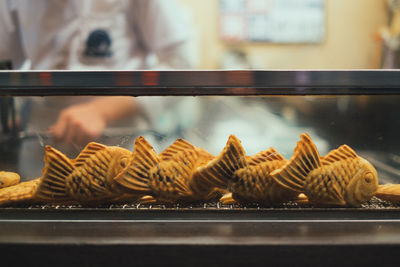 Close-up of food at display cabinet