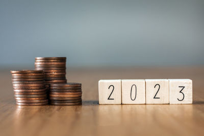 Close-up of coins on table