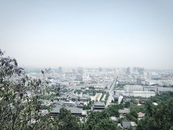 High angle view of cityscape against clear sky