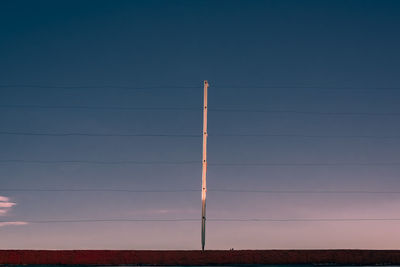 Low angle view of vapor trail against clear sky