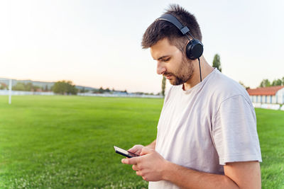 Young man using mobile phone