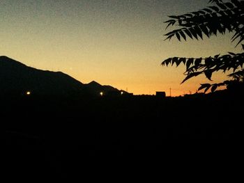 Scenic shot of silhouette mountains against sky at sunset