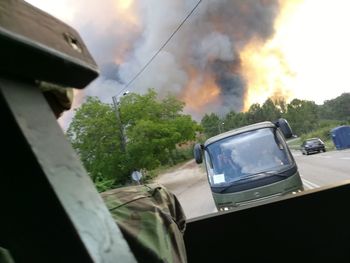 Close-up of car against sky