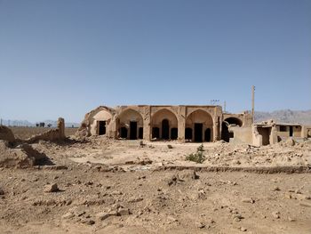 Old ruins of building against clear sky