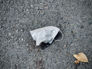 High angle view of garbage on road