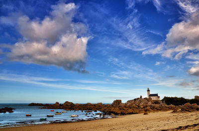 Scenic view of beach against sky