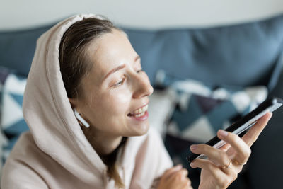 Young woman using mobile phone