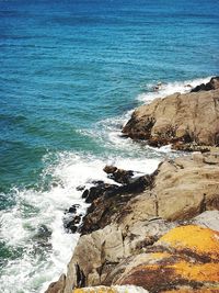 Scenic view of sea against blue sky