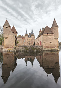 Reflection of buildings in lake