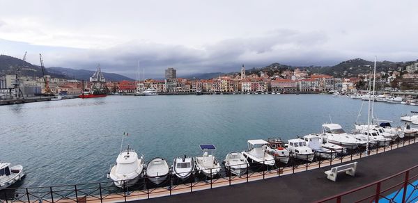 High angle view of harbor by river in city