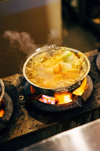 Close-up of burning tea on barbecue grill