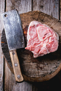 High angle view of meat on cutting board