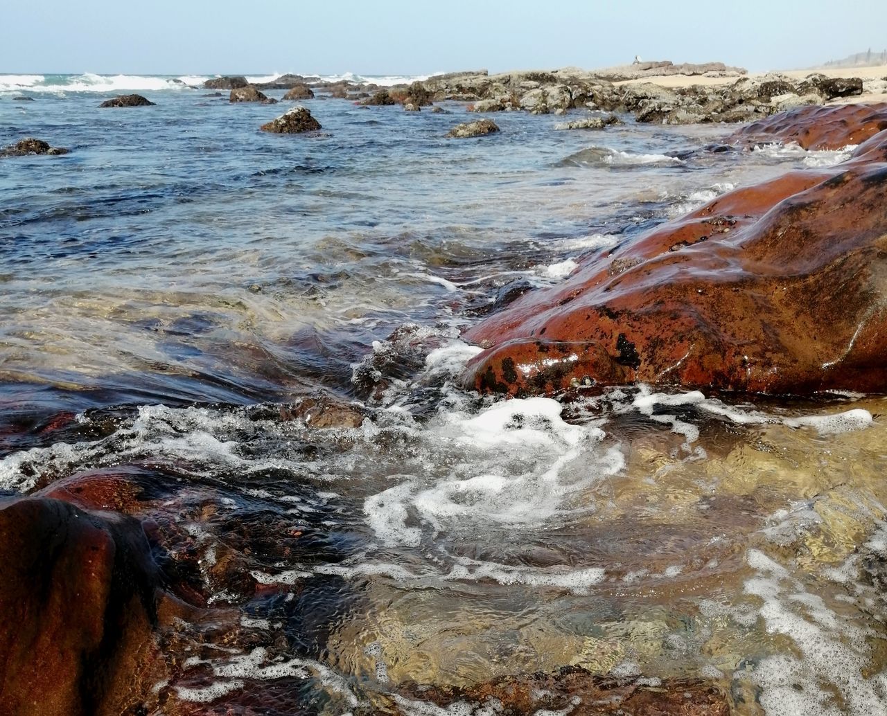 water, motion, rock, sea, solid, no people, nature, rock - object, land, day, aquatic sport, beauty in nature, wave, beach, sport, outdoors, close-up, scenics - nature, power in nature, flowing water, pollution, flowing