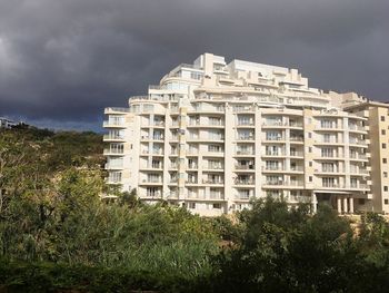 Exterior of residential building against sky