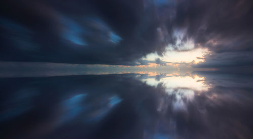Scenic view of dramatic sky during sunset