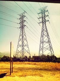 Electricity pylon against sky