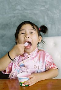 Portrait of a girl eating food