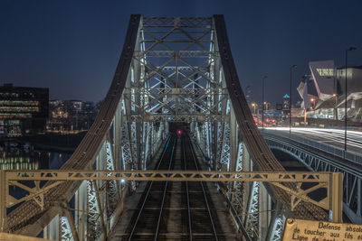 Mulatiere bridge against sky at dusk