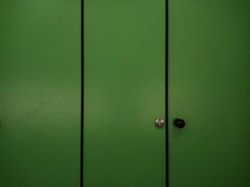 Full frame shot of closed green door