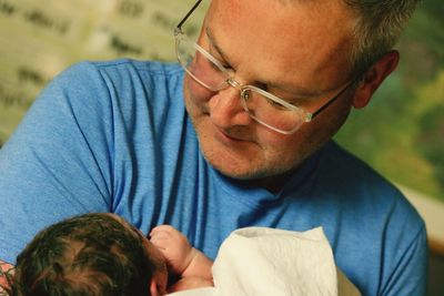 Close-up of mature man with baby boy