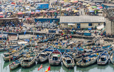 High angle view of boats moored at harbor