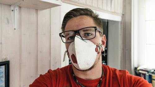 Portrait of man wearing protective mask