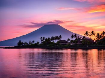 Scenic view of lake against sky during sunset
