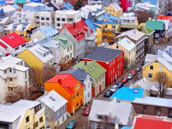 Tilt-shift image of colorful buildings in city