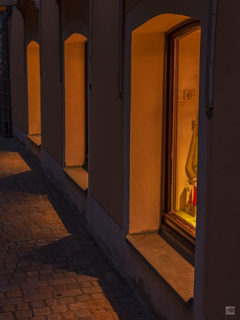 ENTRANCE OF BUILDING WITH YELLOW DOOR