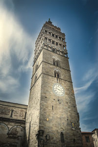 Low angle view of clock tower against sky