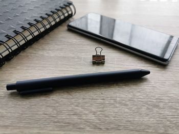 High angle view of mobile phone on table