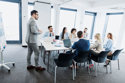 Business colleagues discussing during meeting in office