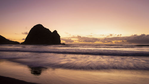 Scenic view of sea against sky during sunset