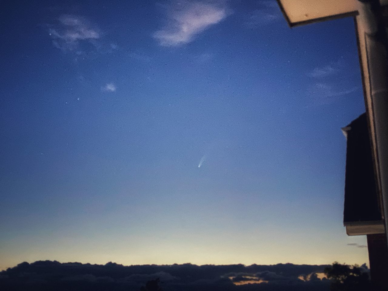 LOW ANGLE VIEW OF MOON AT DUSK