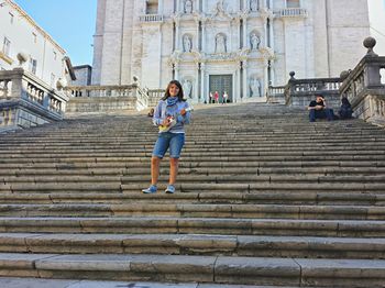 Woman on steps