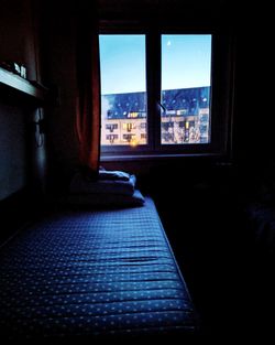 Buildings seen through window at home