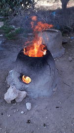 High angle view of bonfire on field