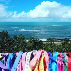 Scenic view of sea against cloudy sky