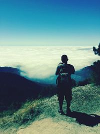 Silhouette of woman standing on landscape