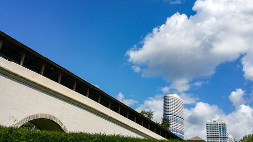 Low angle view of skyscrapers against sky