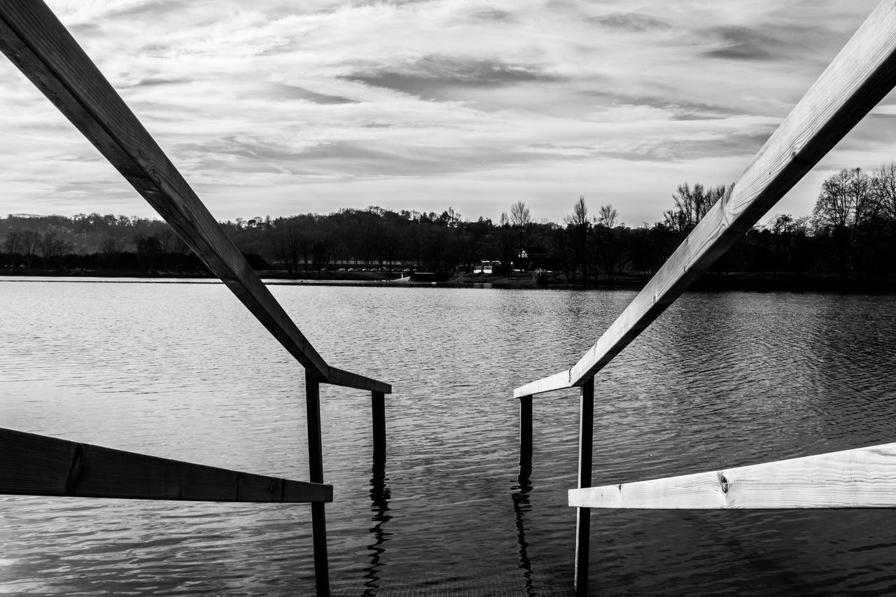 GAZEBO BY RIVER AGAINST SKY