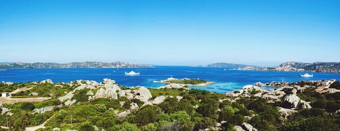 Scenic view of calm sea against clear sky