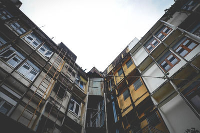 Low angle view of buildings against clear sky