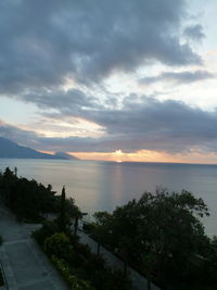 Scenic view of sea against sky at sunset