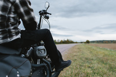 Man riding bicycle on road