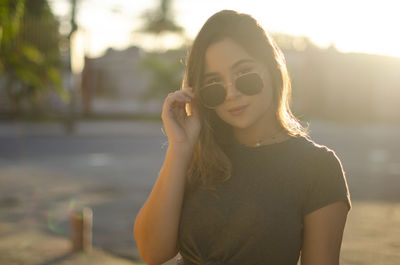 Young woman wearing sunglasses