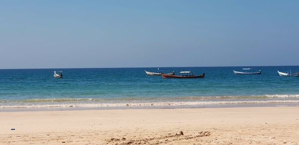 Scenic view of sea against clear sky